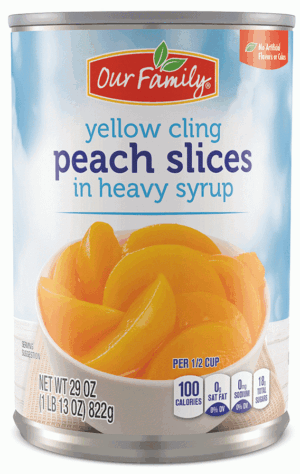 Our Family peach slcies in heavy syrup, yellow cling 29 ounce